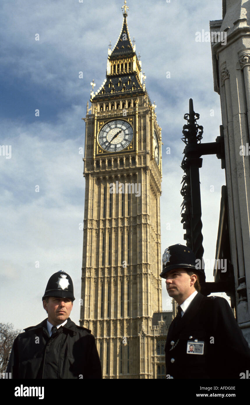 England United Kingdom UK,Great Britain British English,London,Big Ben Clock Tower,two 2 bobbies,police,visitors travel traveling tour tourist tourism Stock Photo