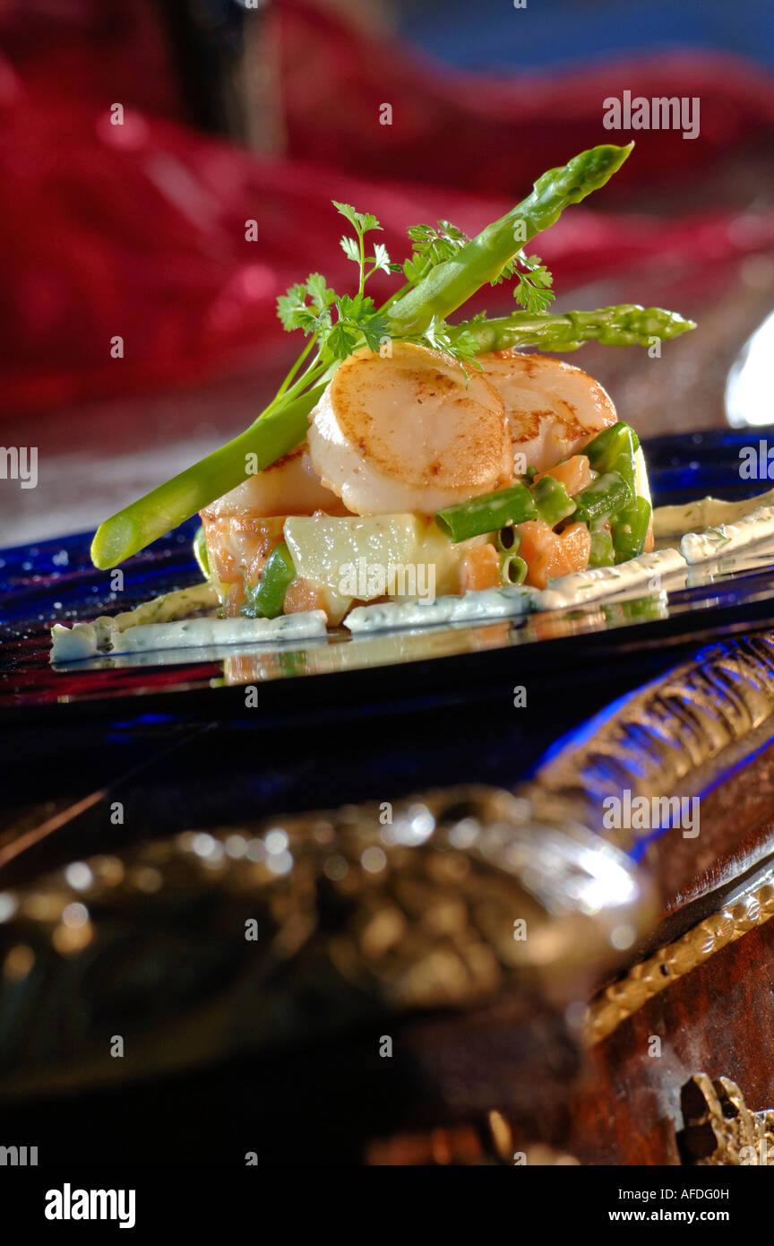 Scallops with asparagus spears Stock Photo Alamy