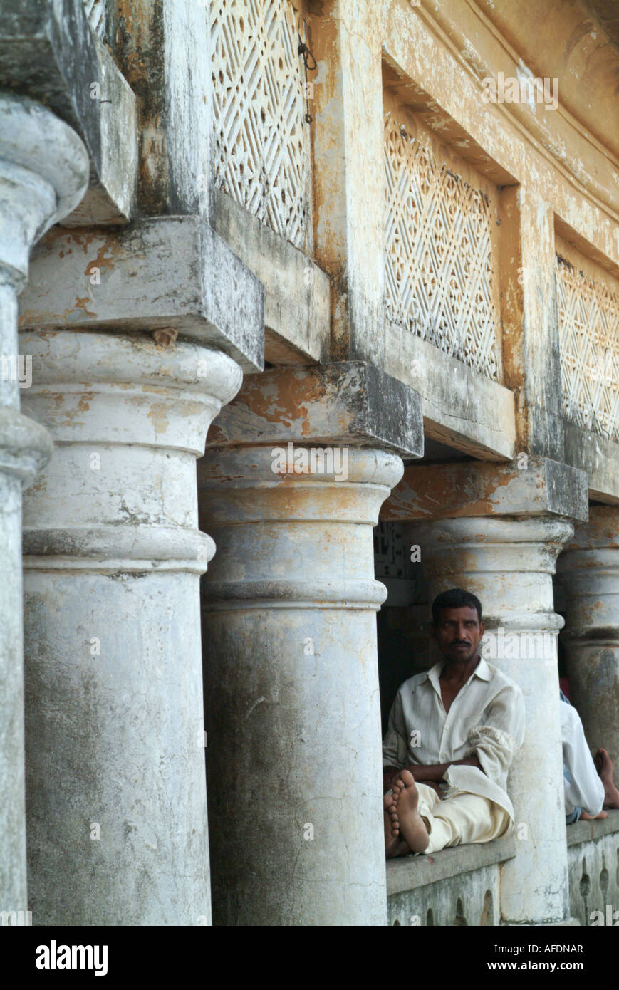 A Nepali man rests in the afternoon in downtown Janakpur, Nepal. Stock Photo