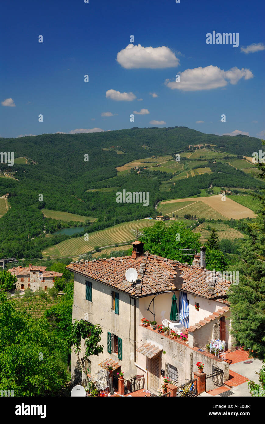 View of vineyards and hillside house from Radda in Chianti Tuscany Italy Stock Photo