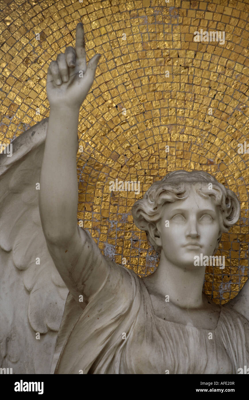 Germany, Frankfurt, graveyard, statue of angel pointing up, closeup