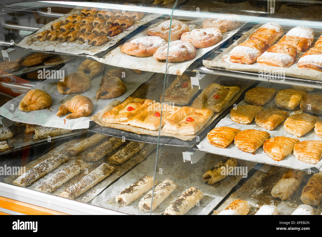 Spanish pastries in glass display case Stock Photo Alamy