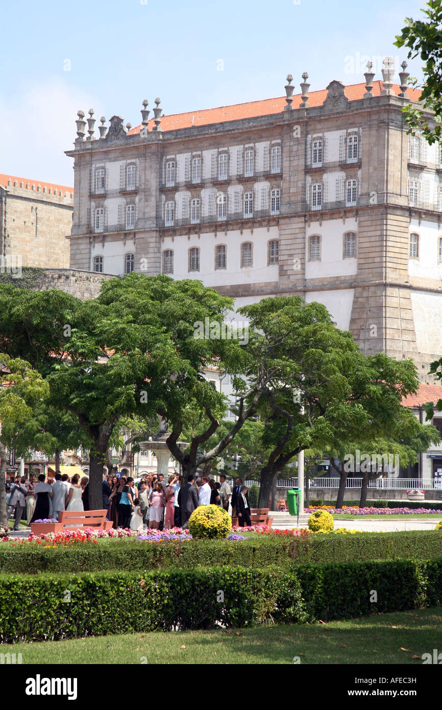 People In The Park At A Wedding Reception Against A Backdrop Of
