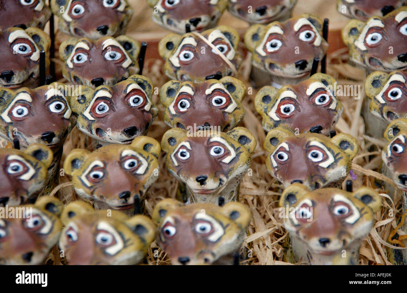 Pottery meerkats on sale in shop UK Stock Photo
