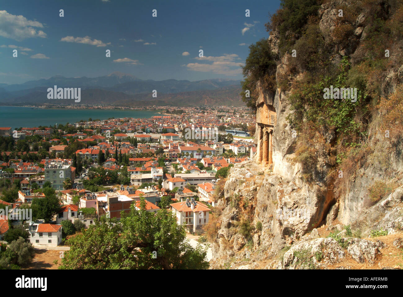 Ancient Lycian Rock Cut Tombs Above the Town of Fethiye, Turqoise Coast, Near Dalaman, Turkey Stock Photo