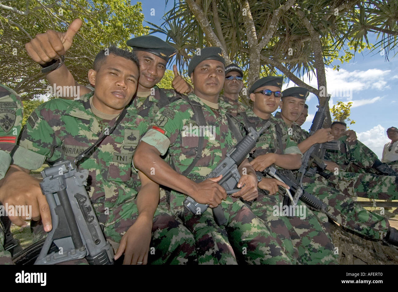 Group portrait of Indonesian soldiers guarding Nusa Dua beach near the venue of an international summit in Bali, Indonesia Stock Photo