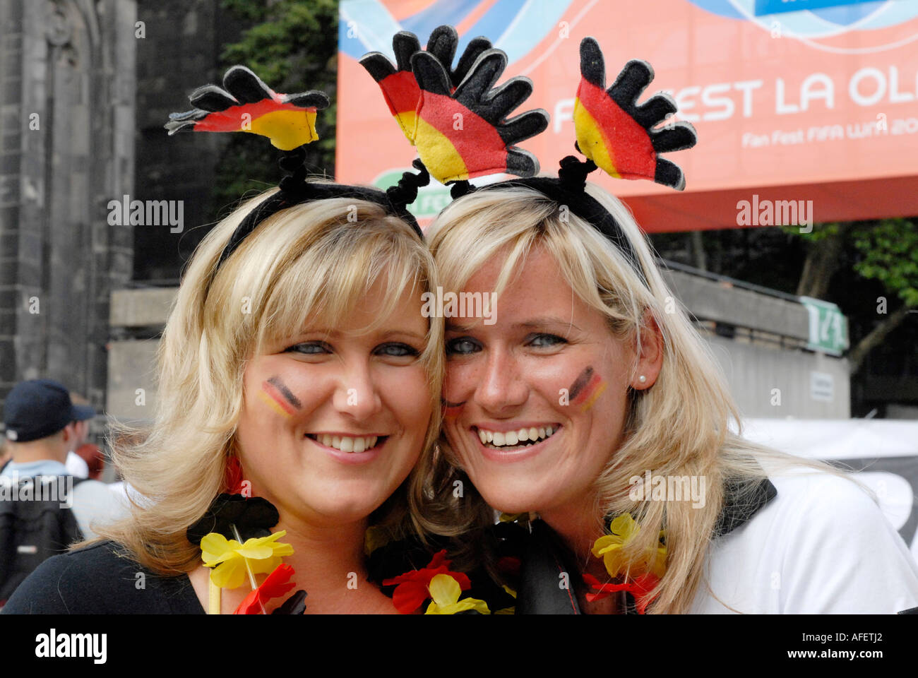 Two female german fans sporting Deeley boppers in the german colours Stock Photo