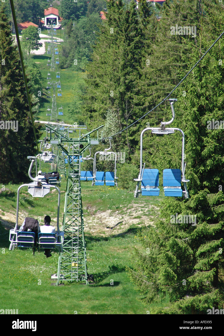 chairlift in the german alps Sessellift auf das Hoernle bei Bad Kohlgrub in den Ammergauer Alpen Stock Photo