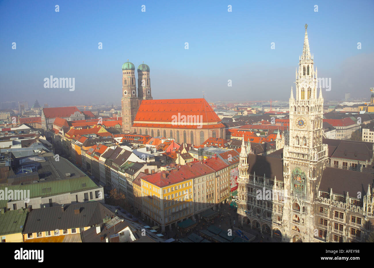 Europe, Germany, Bavaria, Bayern, Munich, Marienplatz, Frauenkirche left and Neues Rathaus right Stock Photo