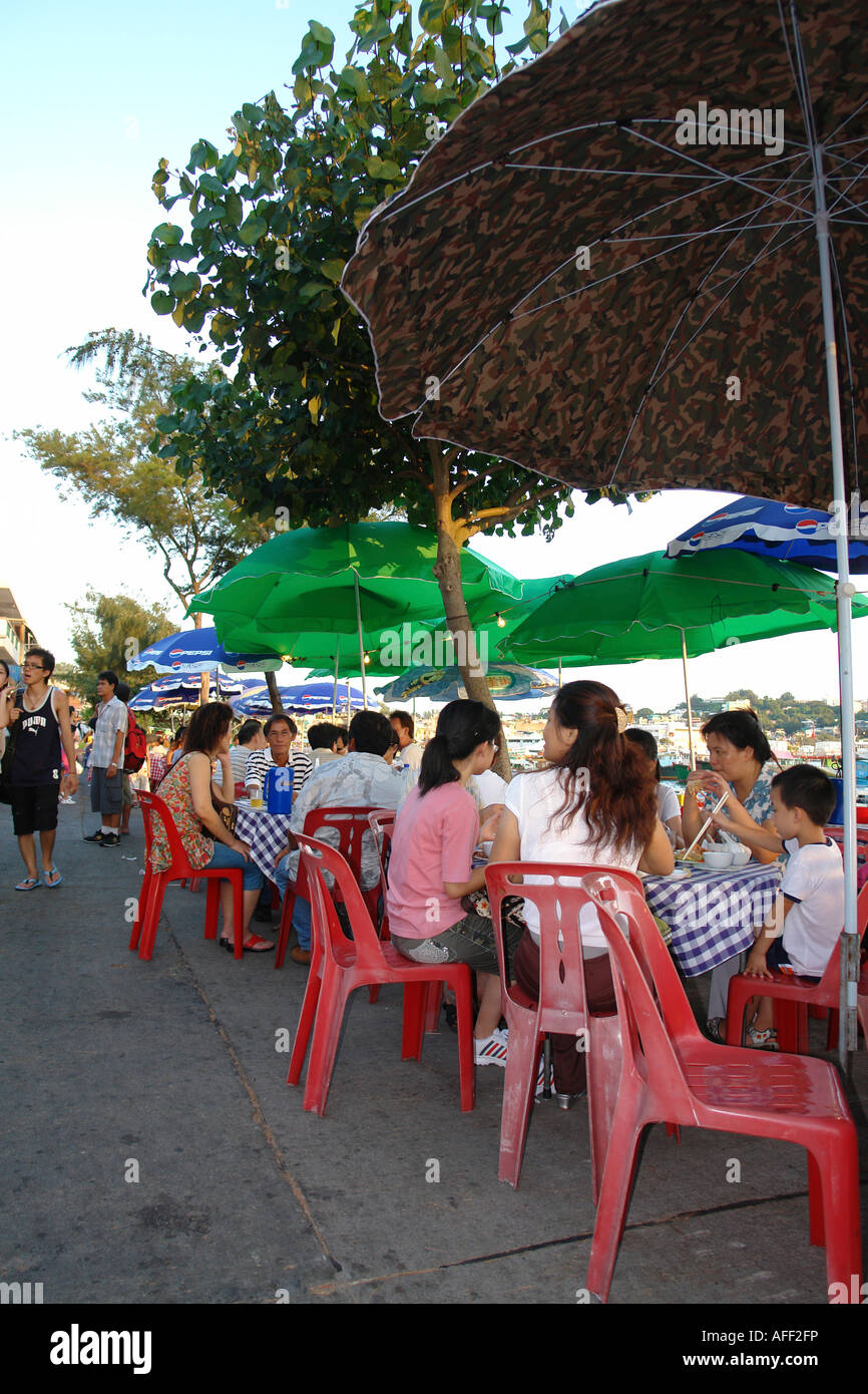 Street restaurants along the harbour area Cheung Chau island Hong Kong China Stock Photo