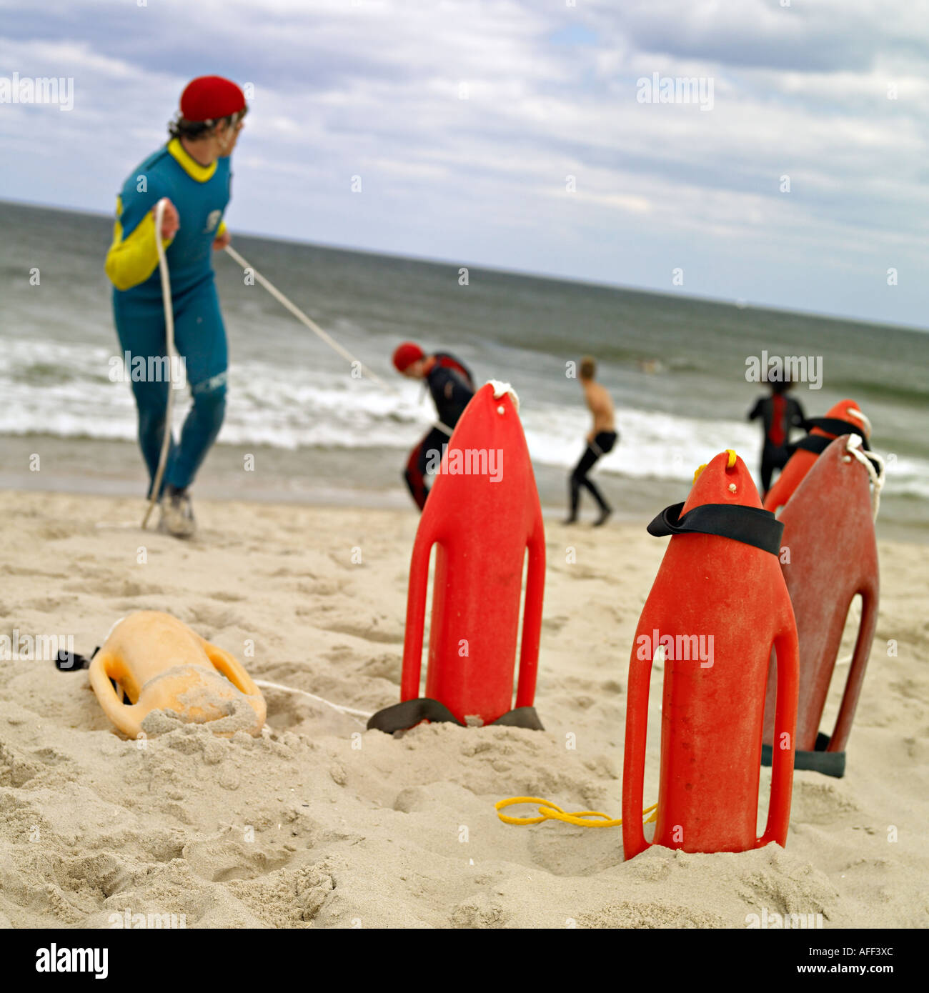 team of lifeguards training at the beach Stock Photo - Alamy