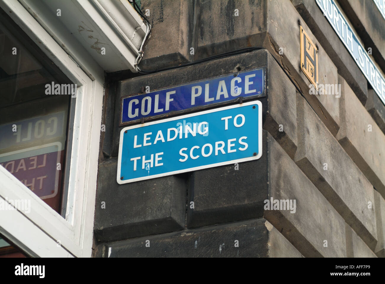 Street signs 'Golf Place' and 'Leading to the Scores' in St. Andrews, Fife, Scotland, UK. Stock Photo