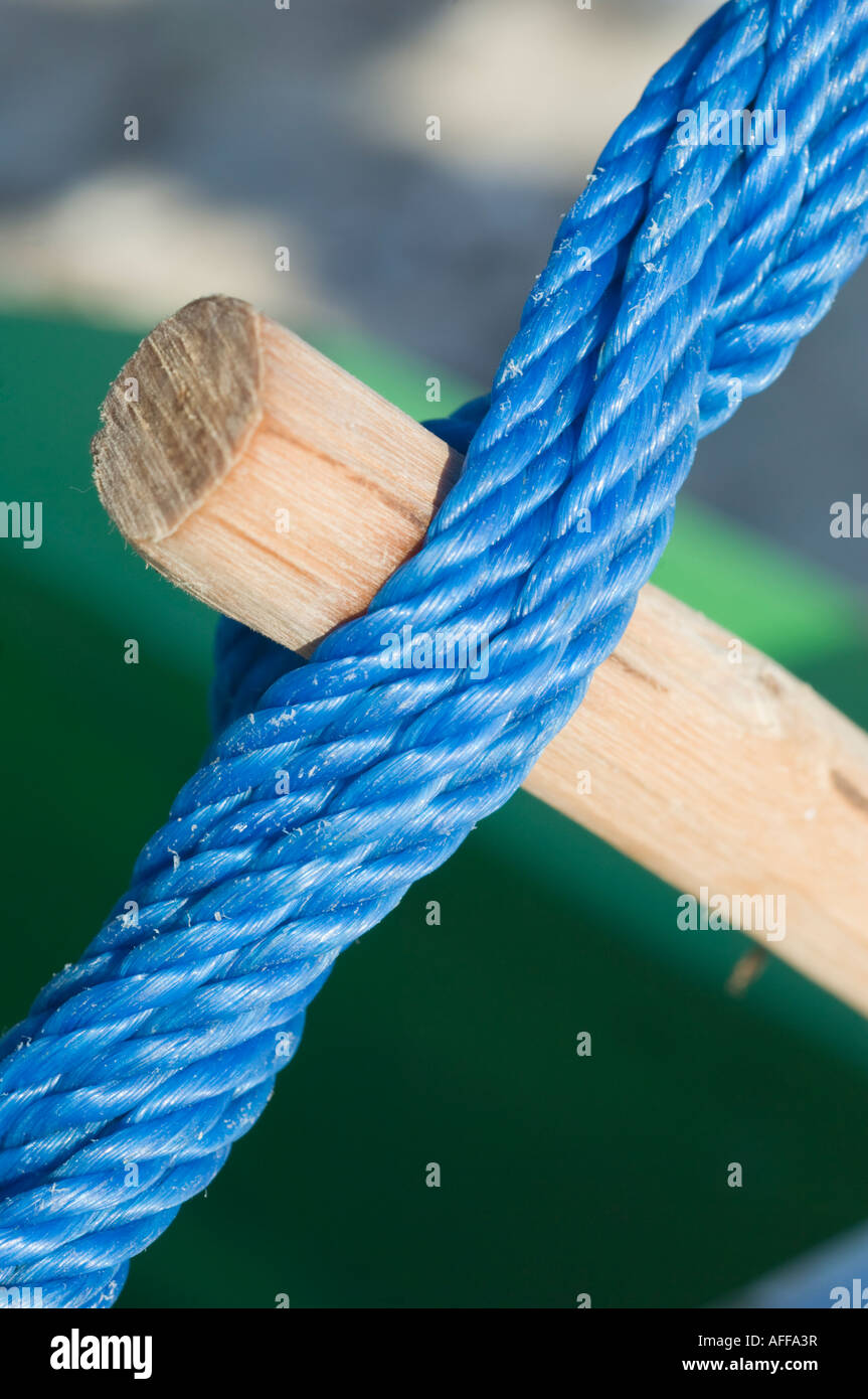 Rope tied wood stick hires stock photography and images Alamy