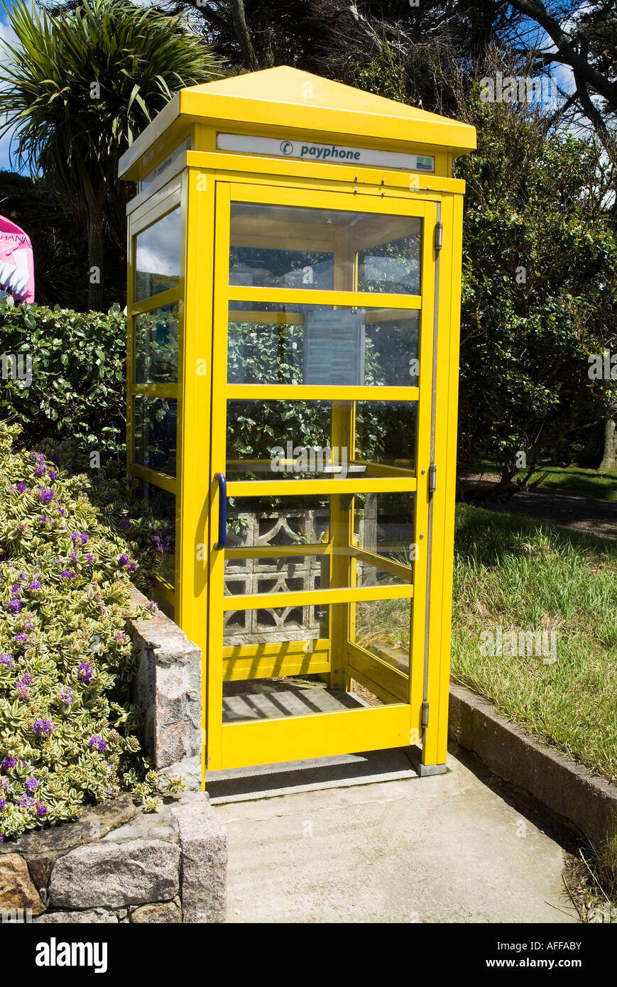 dh TELEPHONES JERSEY Jersey telecom yellow telephone box kiosk payphone  coin pay phone phonebox Stock Photo - Alamy