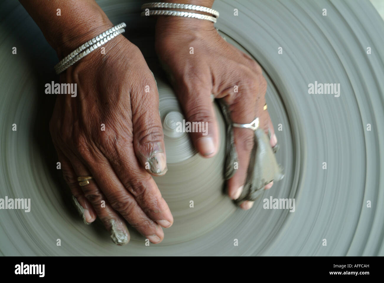 A potter works on a pot in Janakpur, Nepal. Stock Photo