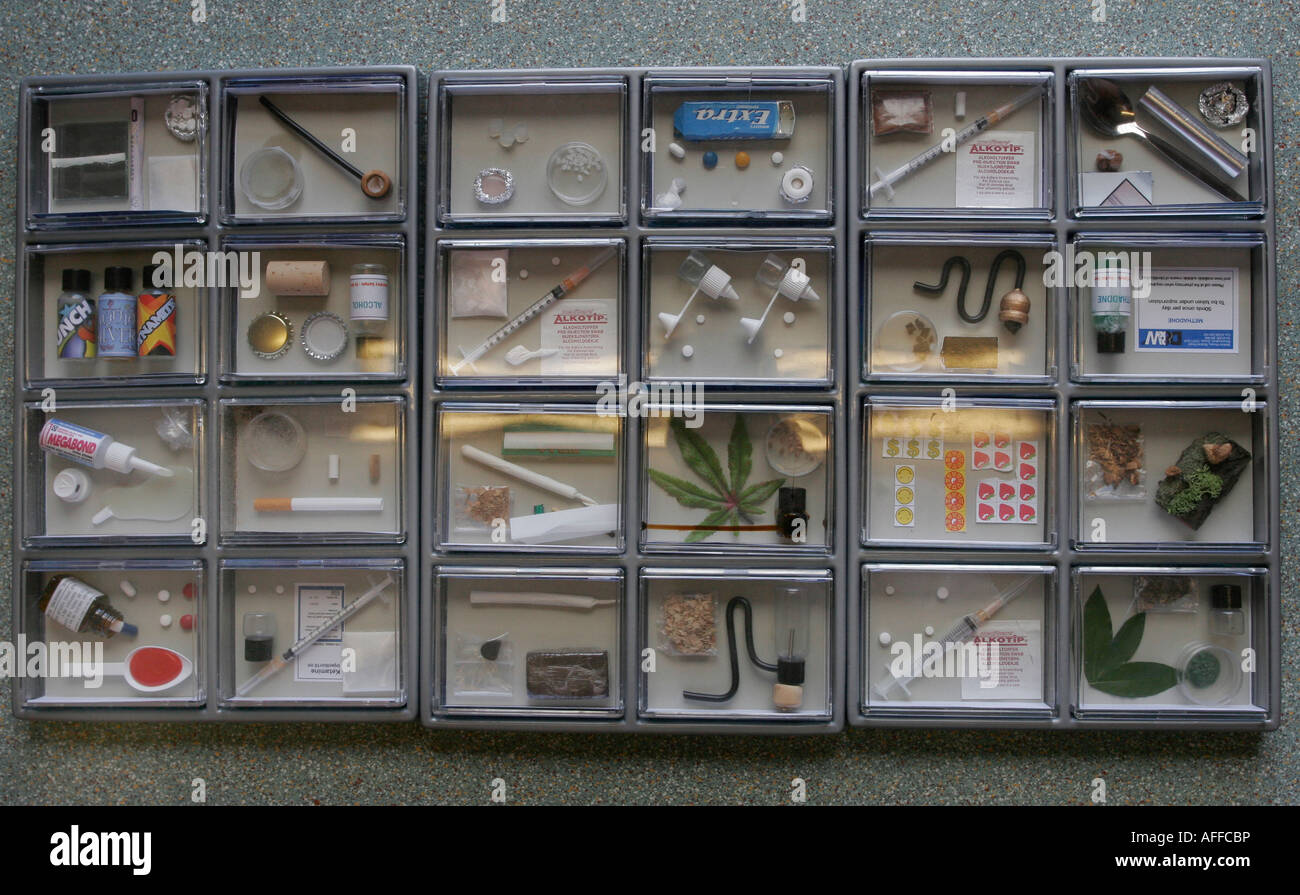 Display case full of legal and illegal drug samples for drug prevention