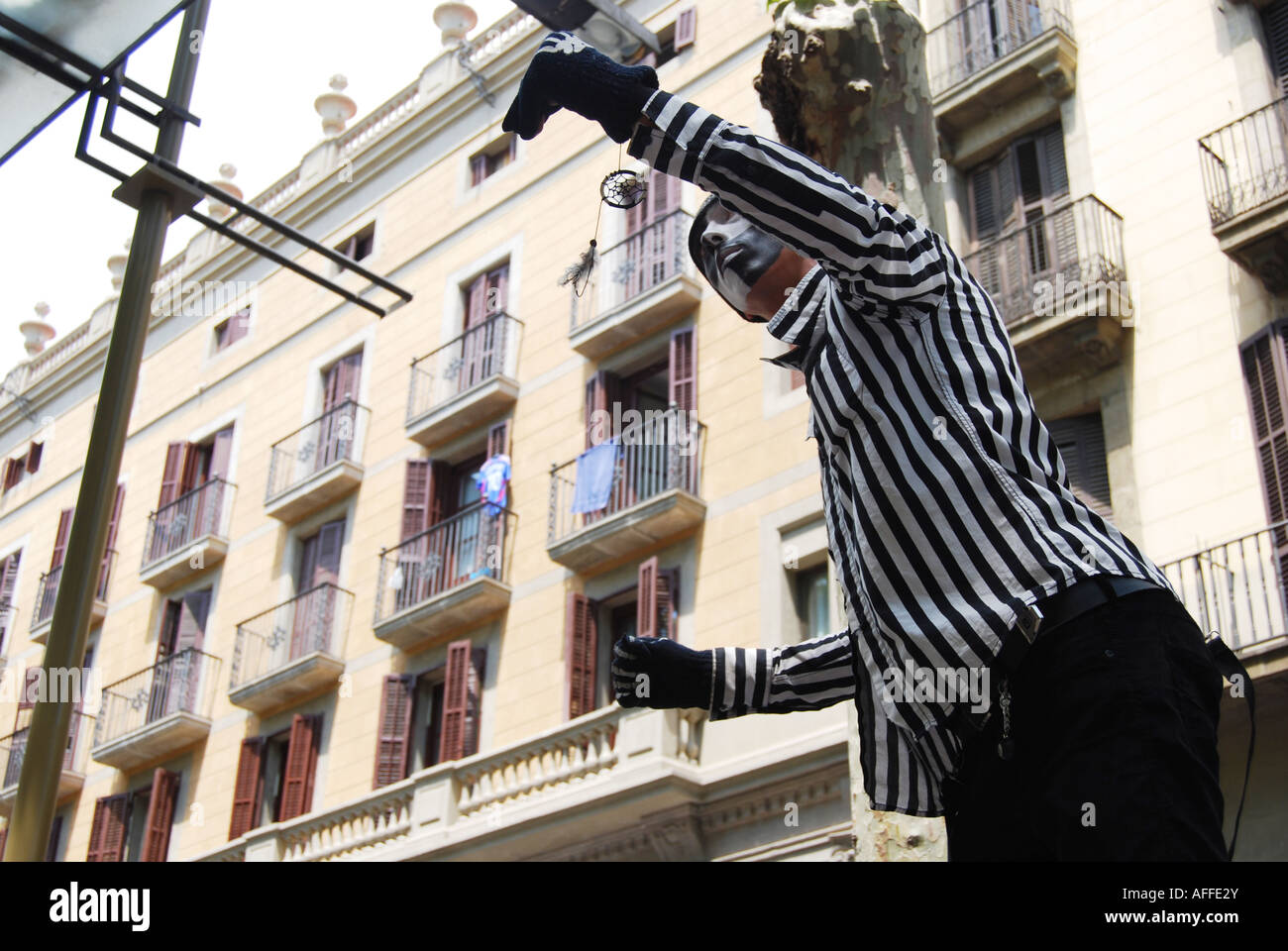 Mime artist performing his routine on Ramblas Barcelona Spain Stock Photo