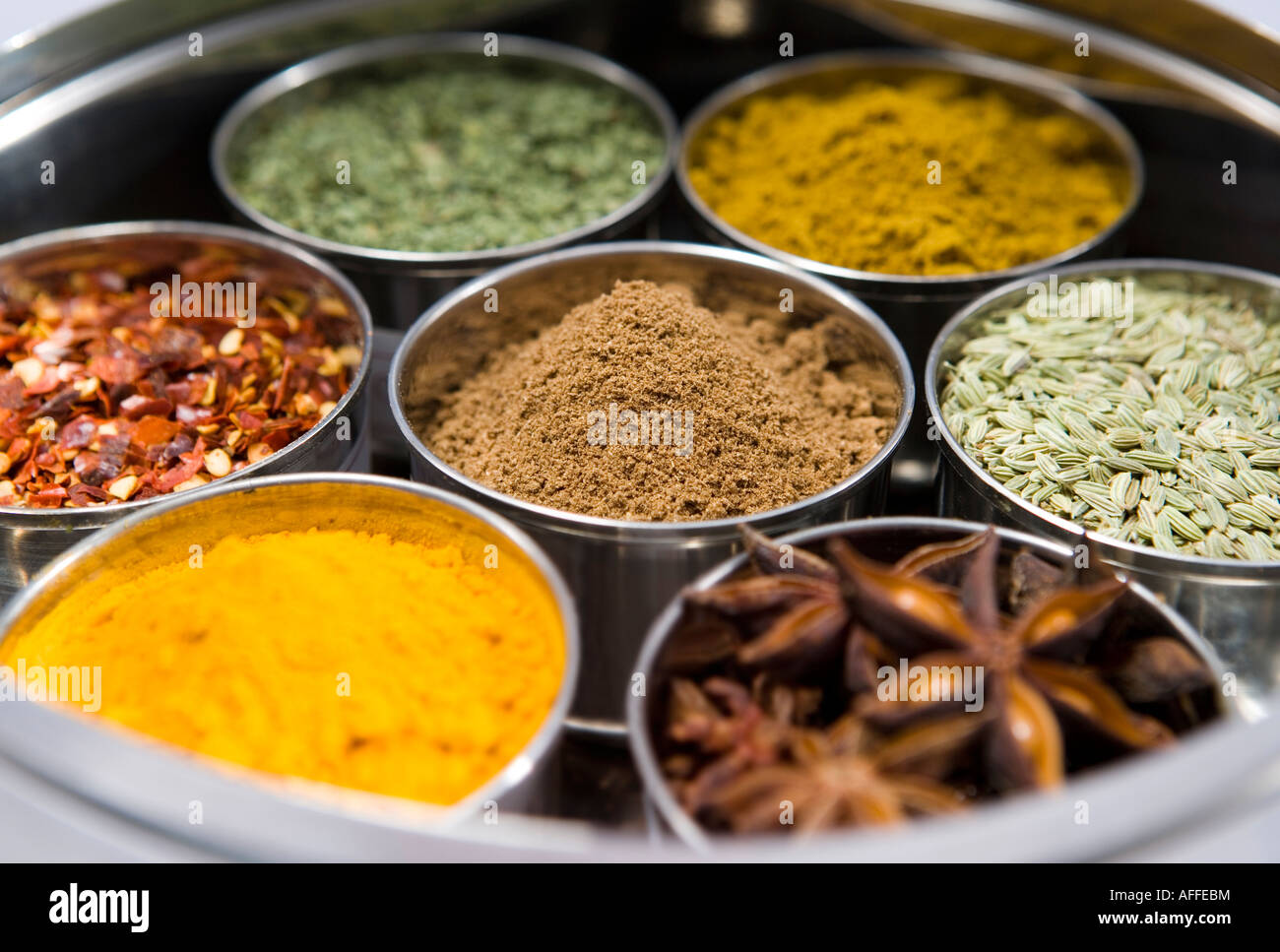 Mixed spices in containers Stock Photo