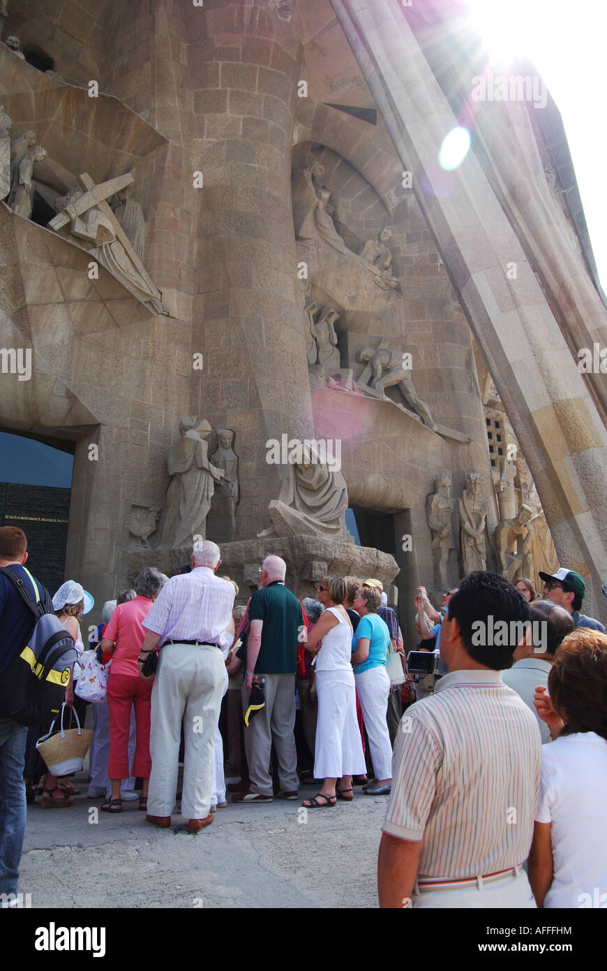 crowd of tourists at entrance to west wing of Sagrado Familia Barcelona Passion facade Barcelona Spain Stock Photo
