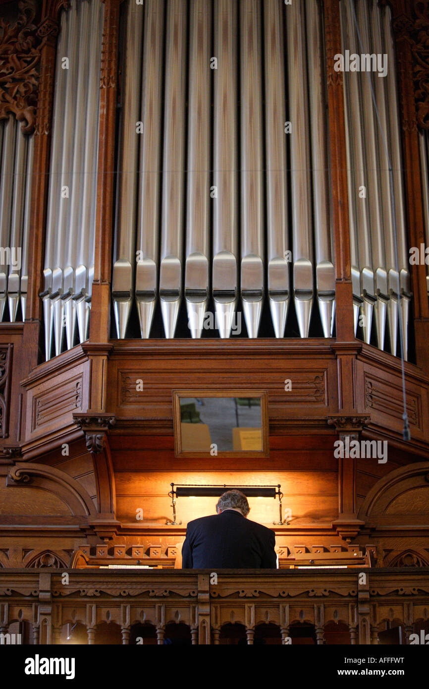 Organist in the church Thomaskirche Stock Photo