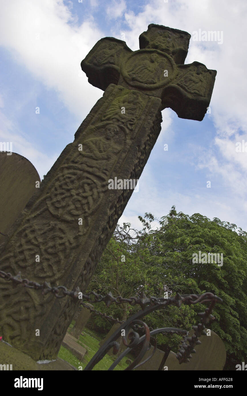 An 8th century celtic cross. Eyam, Derbyshire, United Kingdom. Stock Photo