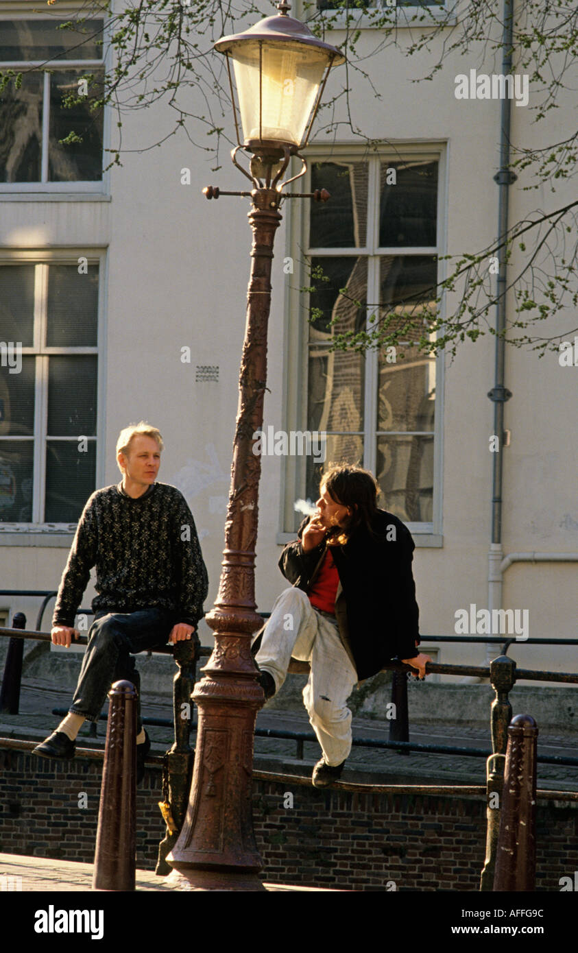 Men Chatting Amsterdam Holland Stock Photo