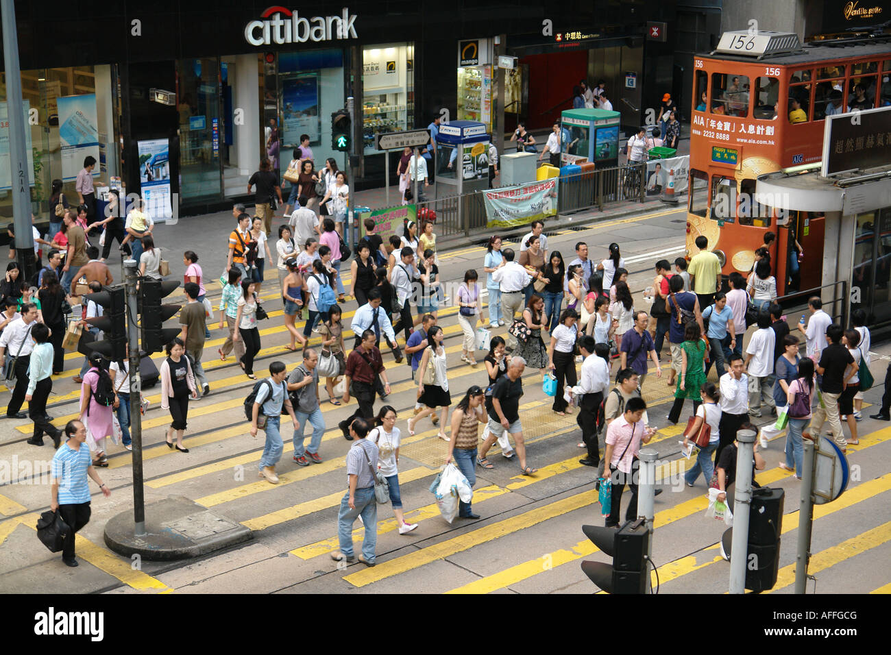 Pedestrian crossing road Central district Hong Kong China Stock Photo