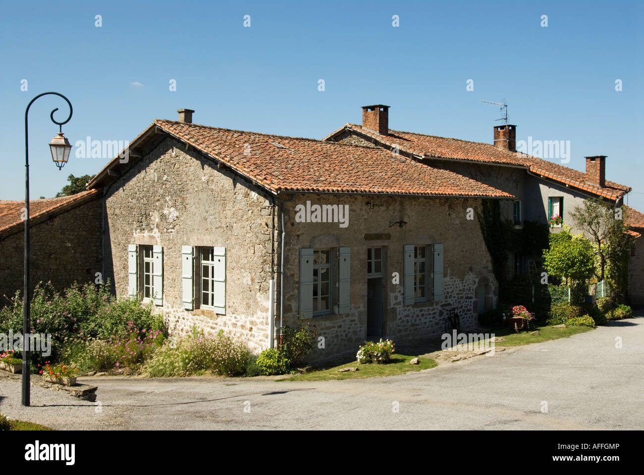 Image of the restored school house in the village of Montrol Senard in the Limousin region of France Stock Photo