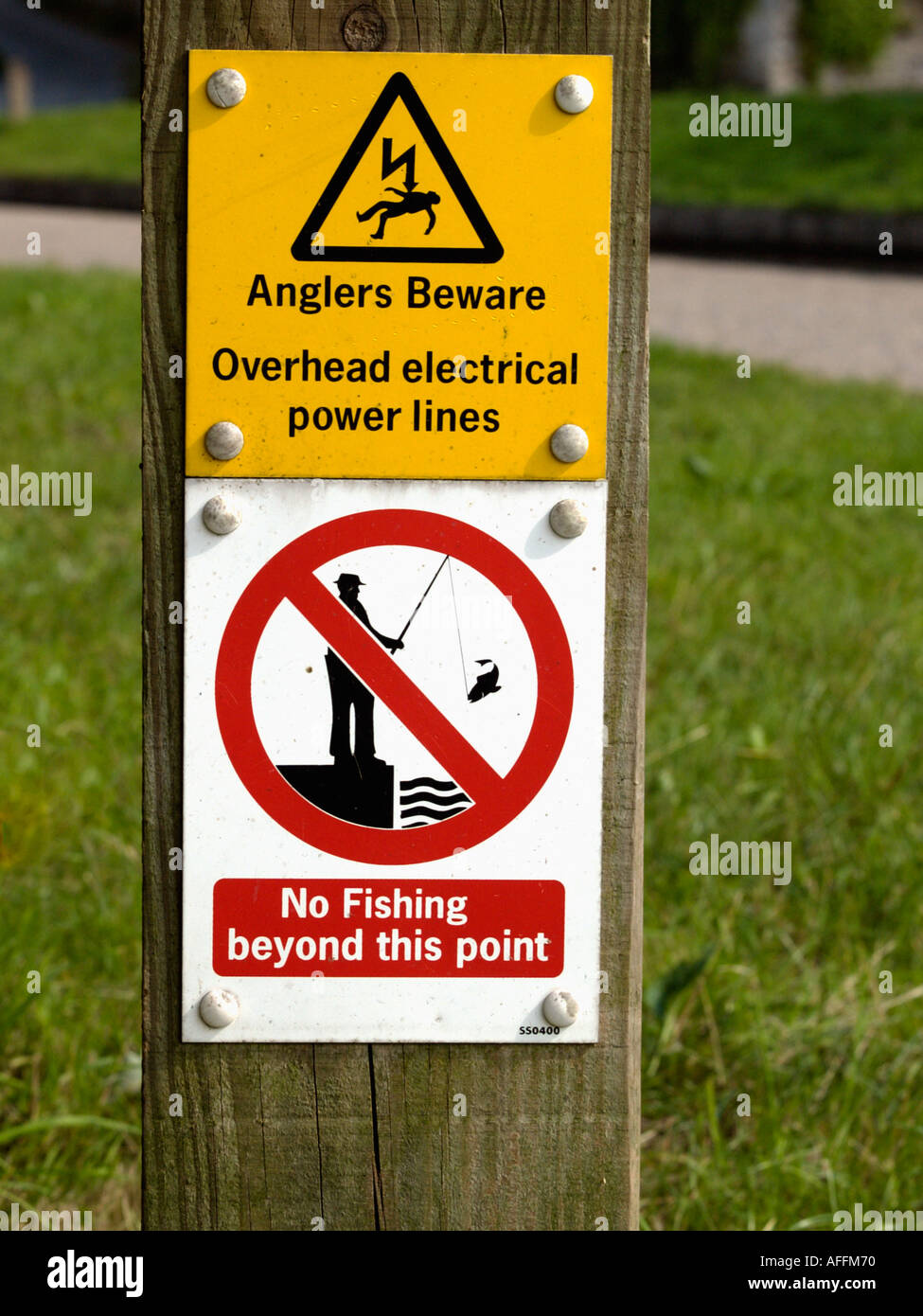 No Fishing Sign Warning of overhead cables Stock Photo - Alamy