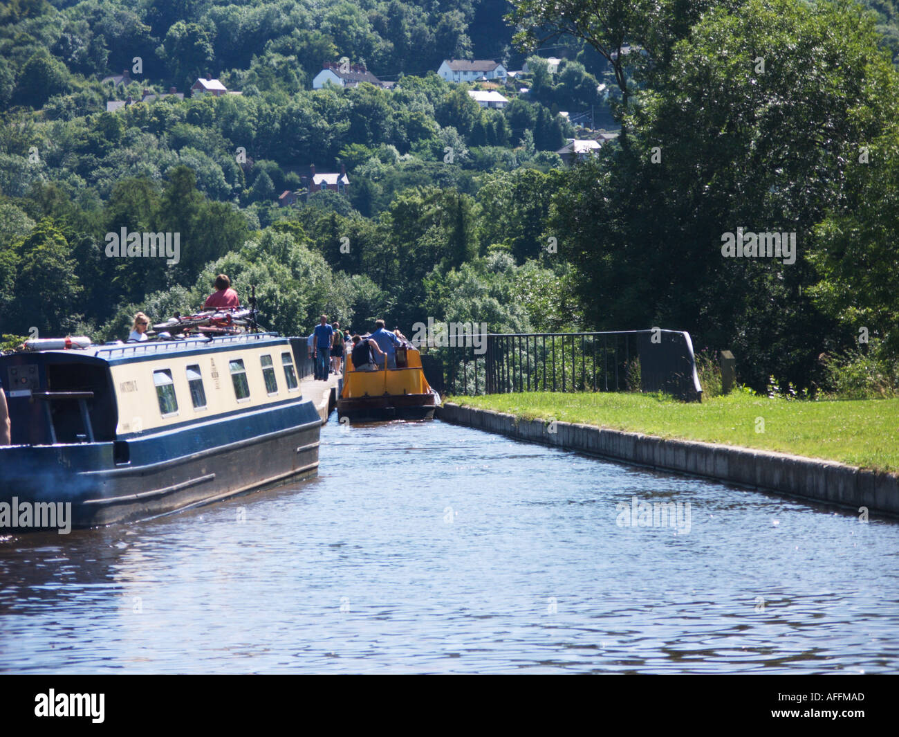 Boat entering aquaduct Stock Photo - Alamy