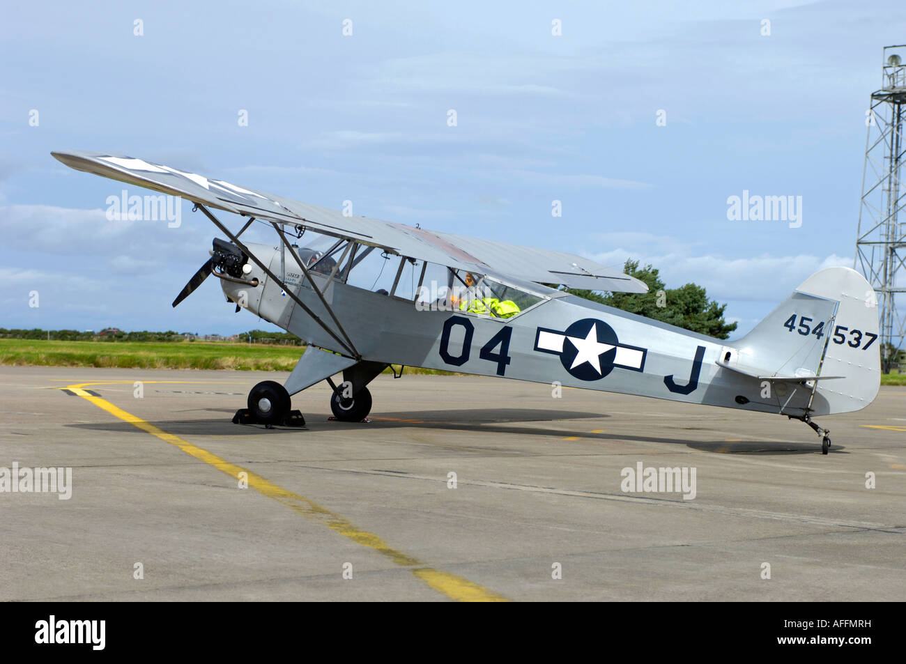 Piper L4 J-3C-65 Cub with US Military Variant of this Aircraft Stock Photo