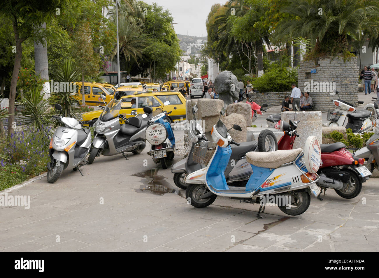scooters and small motorcycles parked on the streets of Bodrum in