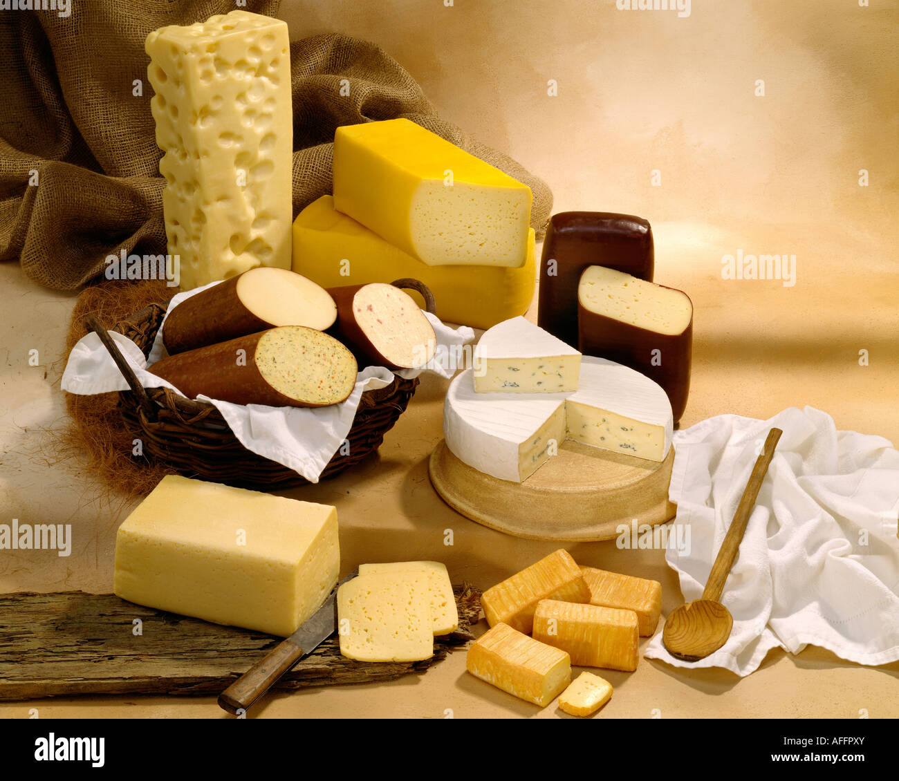 German Cheeses in group color photograph on tan toned mottled