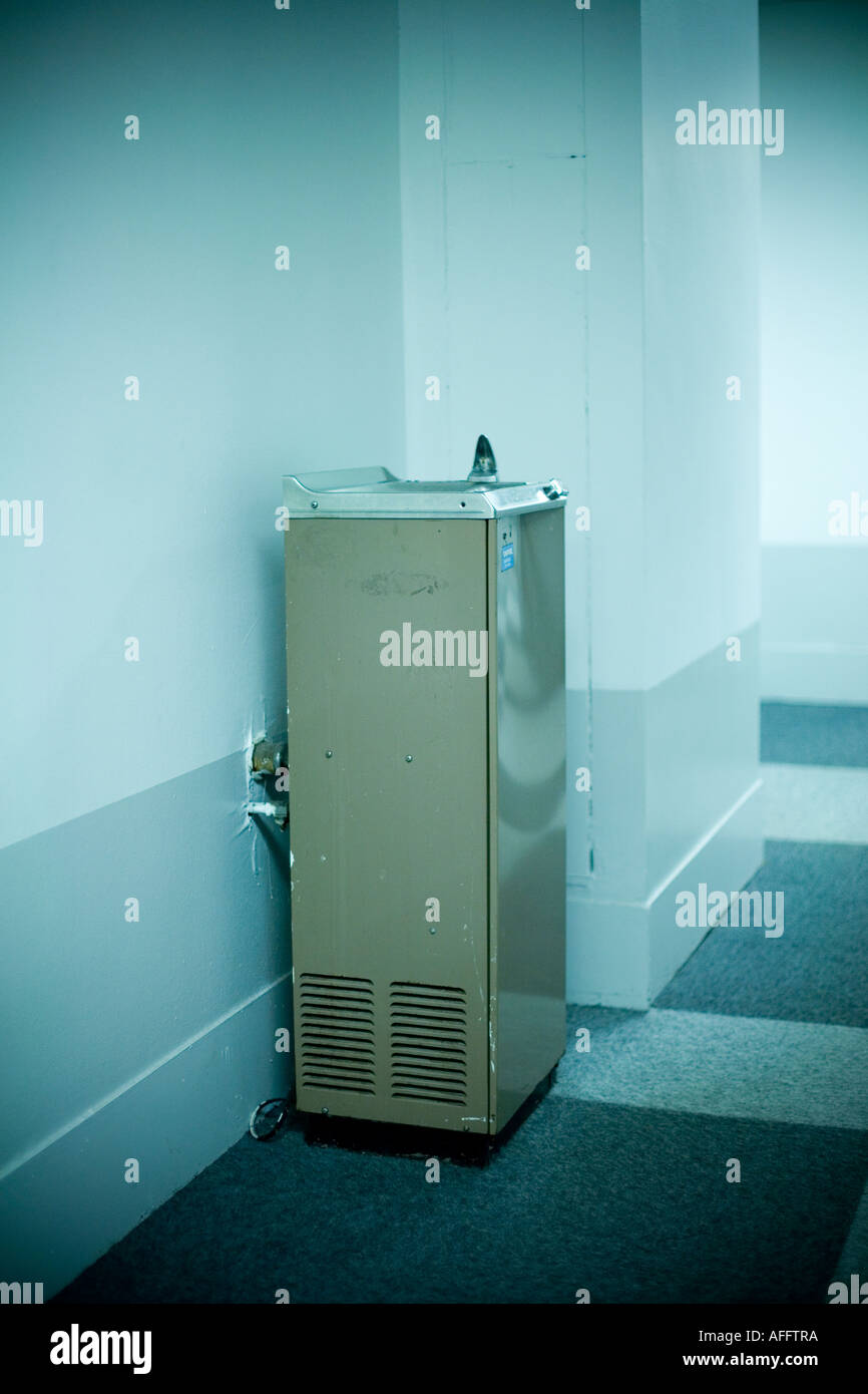 a water fountain in a hallway Stock Photo Alamy