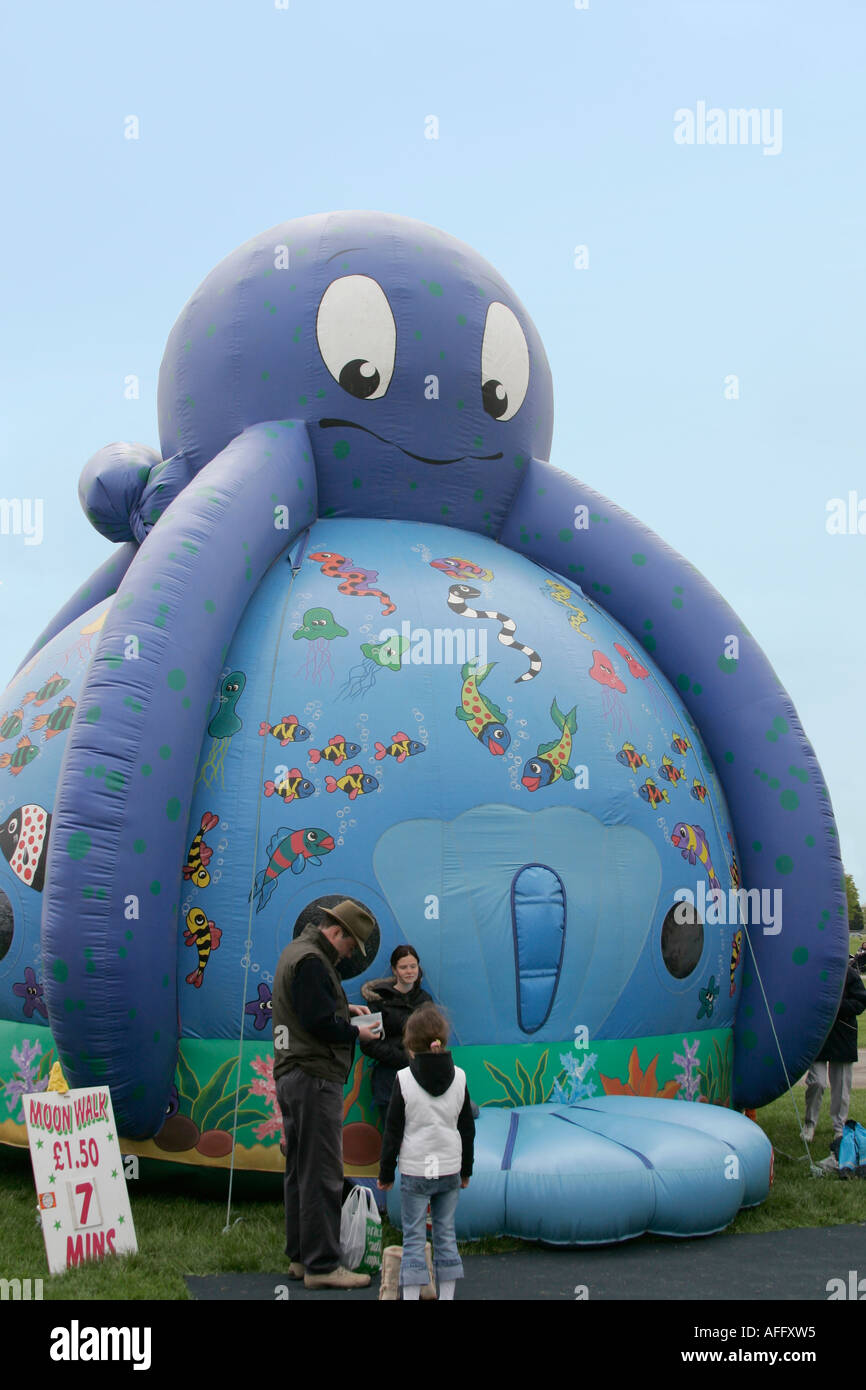 Giant Inflatable Octopus attraction at country fair Stock Photo - Alamy