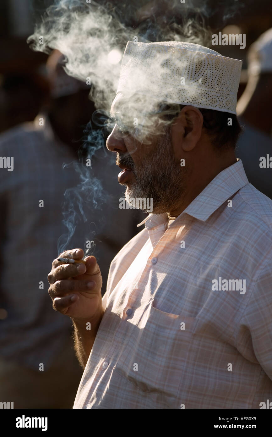 Fish with cigarette hi-res stock photography and images