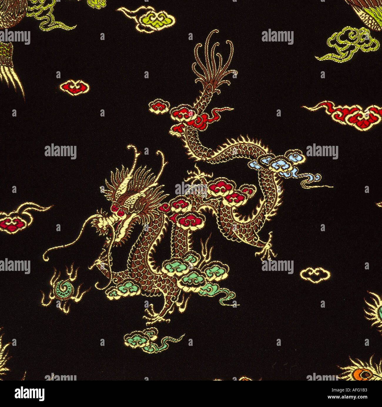 Black silk textile with dragon motif Stock Photo