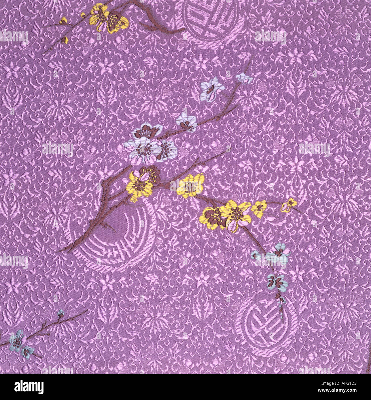 Silk textile with cherry blossom motif Stock Photo