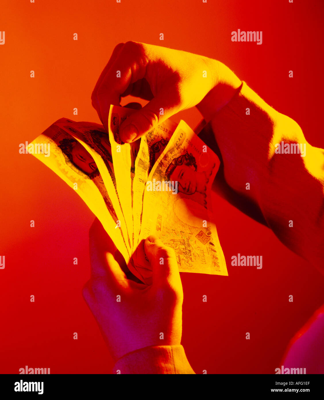 Hand counting british pounds hires stock photography and images Alamy