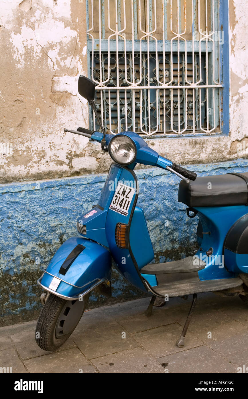 Moped parked in an alleyway in Stone Town Zanzibar Stock Photo