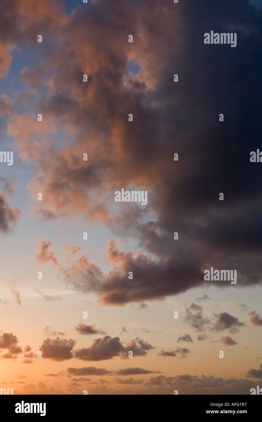 Cloud lit by the first light of sunrise Stock Photo
