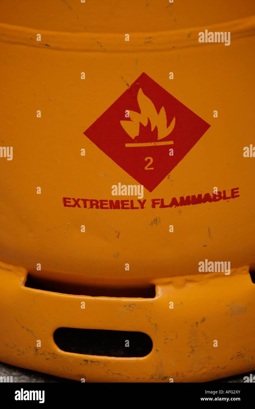 Yellow gas canister with extremely flammable warning Stock Photo