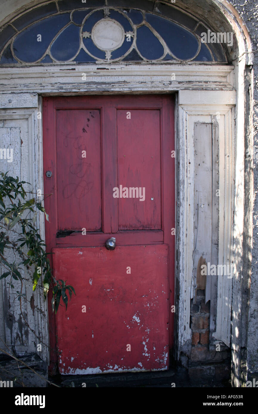 Old dilapidated front door in Monkstown, Dublin Stock Photo