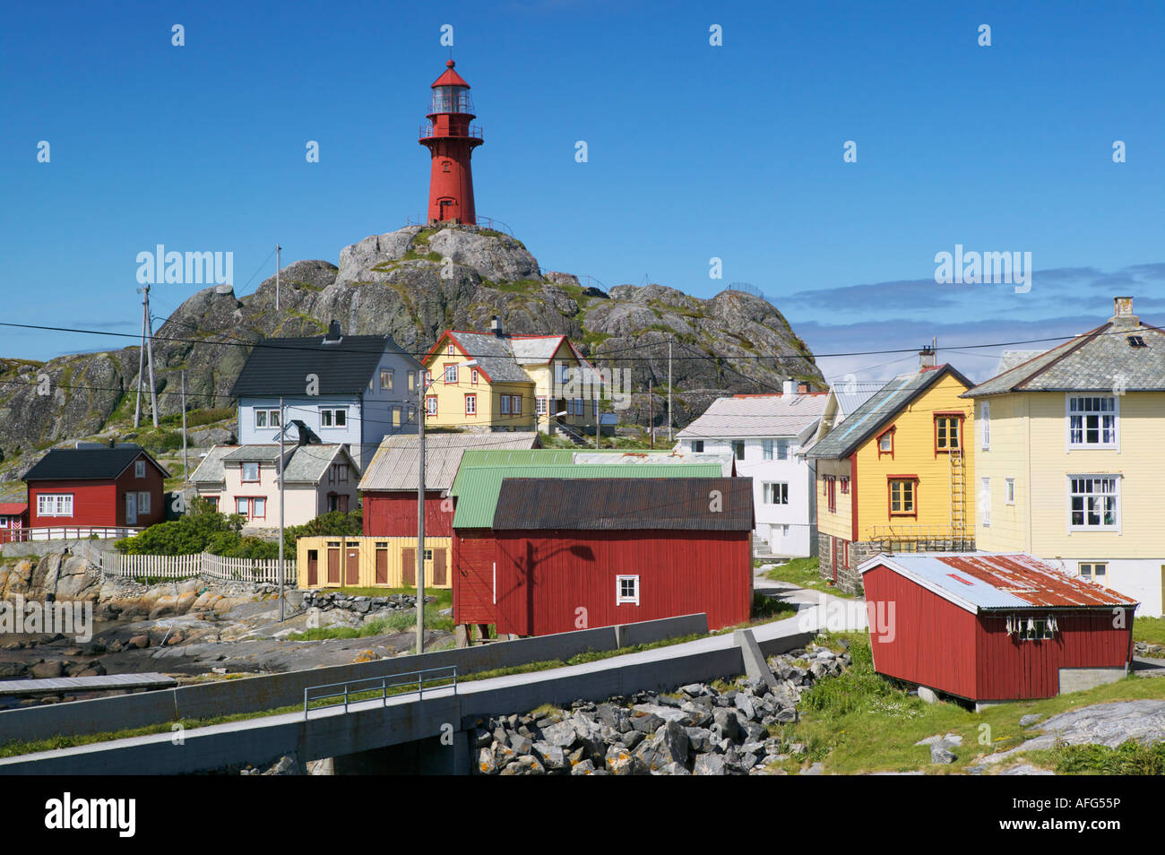 The Ona Lighthouse On Onakalven Above The Fishing Village Of Ona Sandoy 