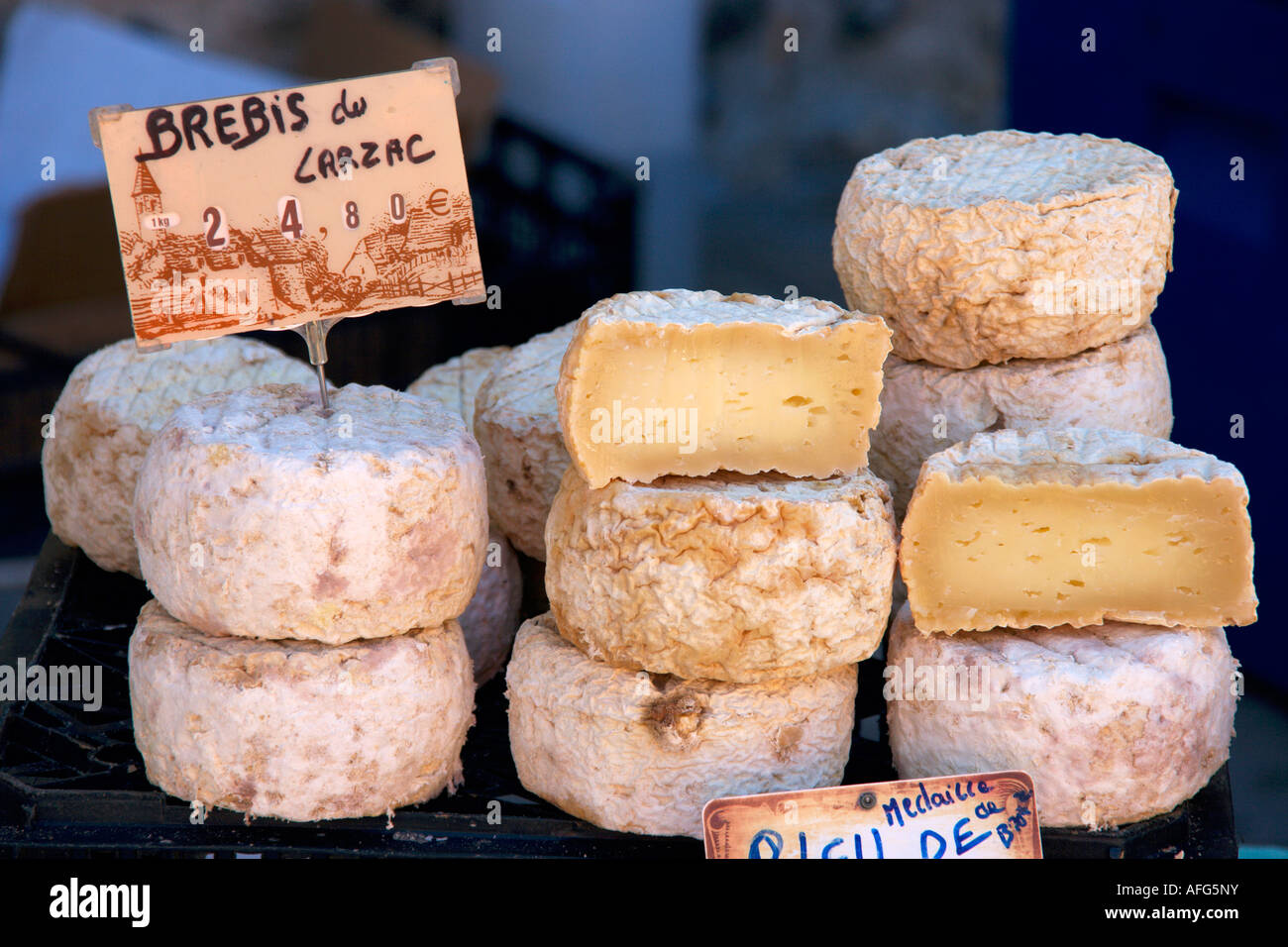 Cheese for sale on a French Market, Languedoc Roussillon region of the  south of France Stock Photo - Alamy