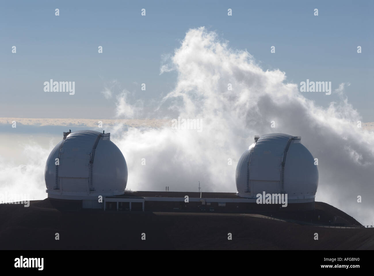 Keck observatory domes at sunset on the summit of Mauna Kea Big Island