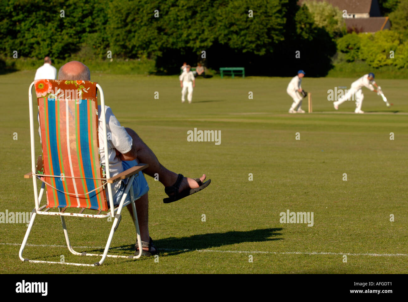 Cricket, spectators watch a village cricket match, Briatin UK Stock Photo