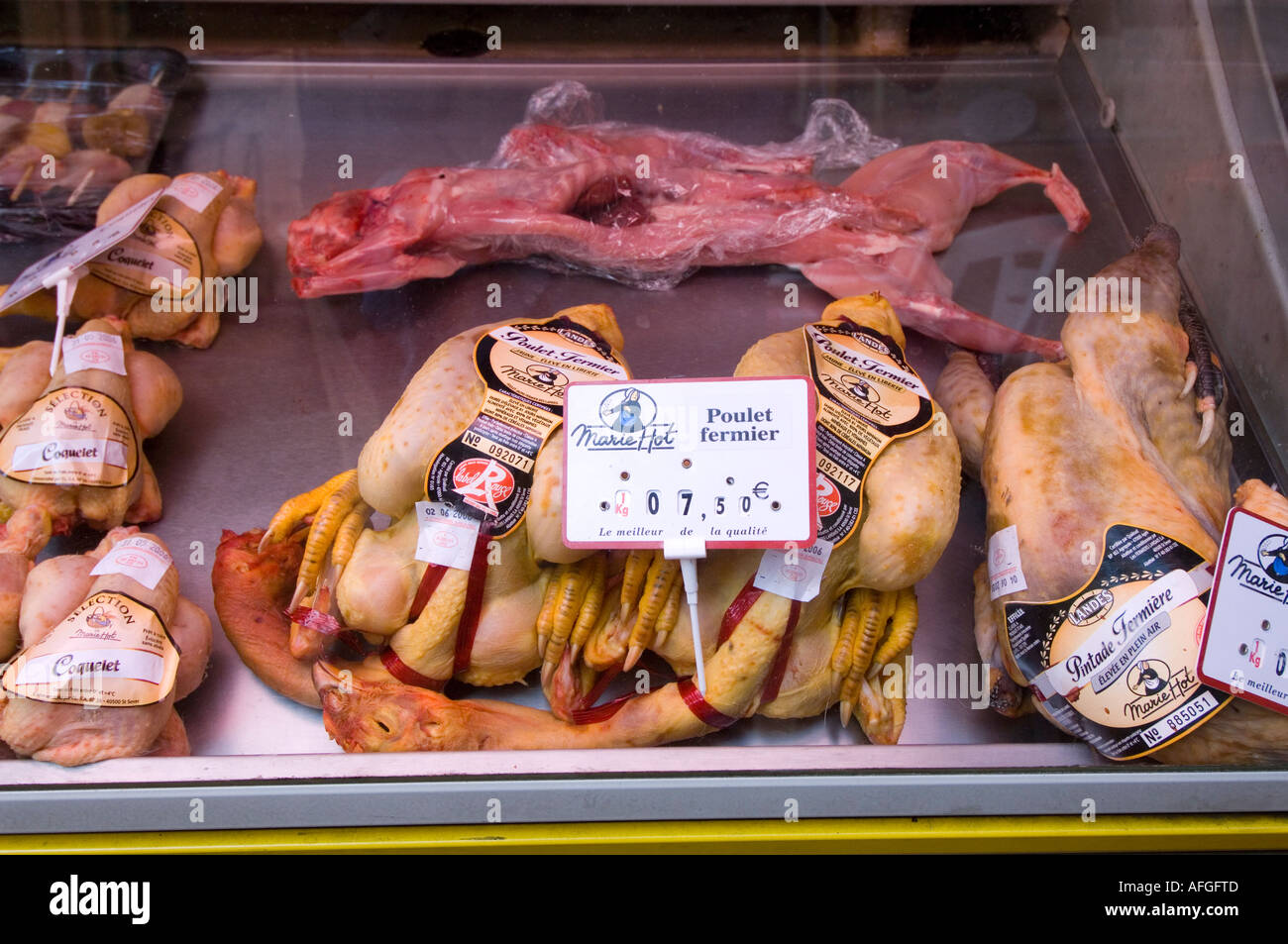 Chicken and rabbit on sale in a butchers shop in Nice France Cote d