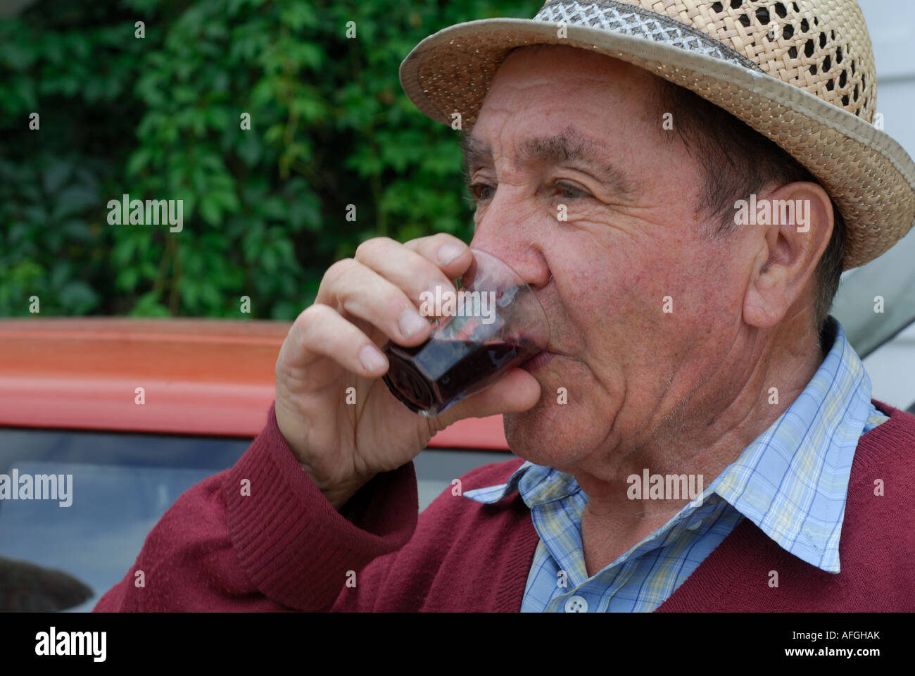 Frenchman drinking red wine. Stock Photo