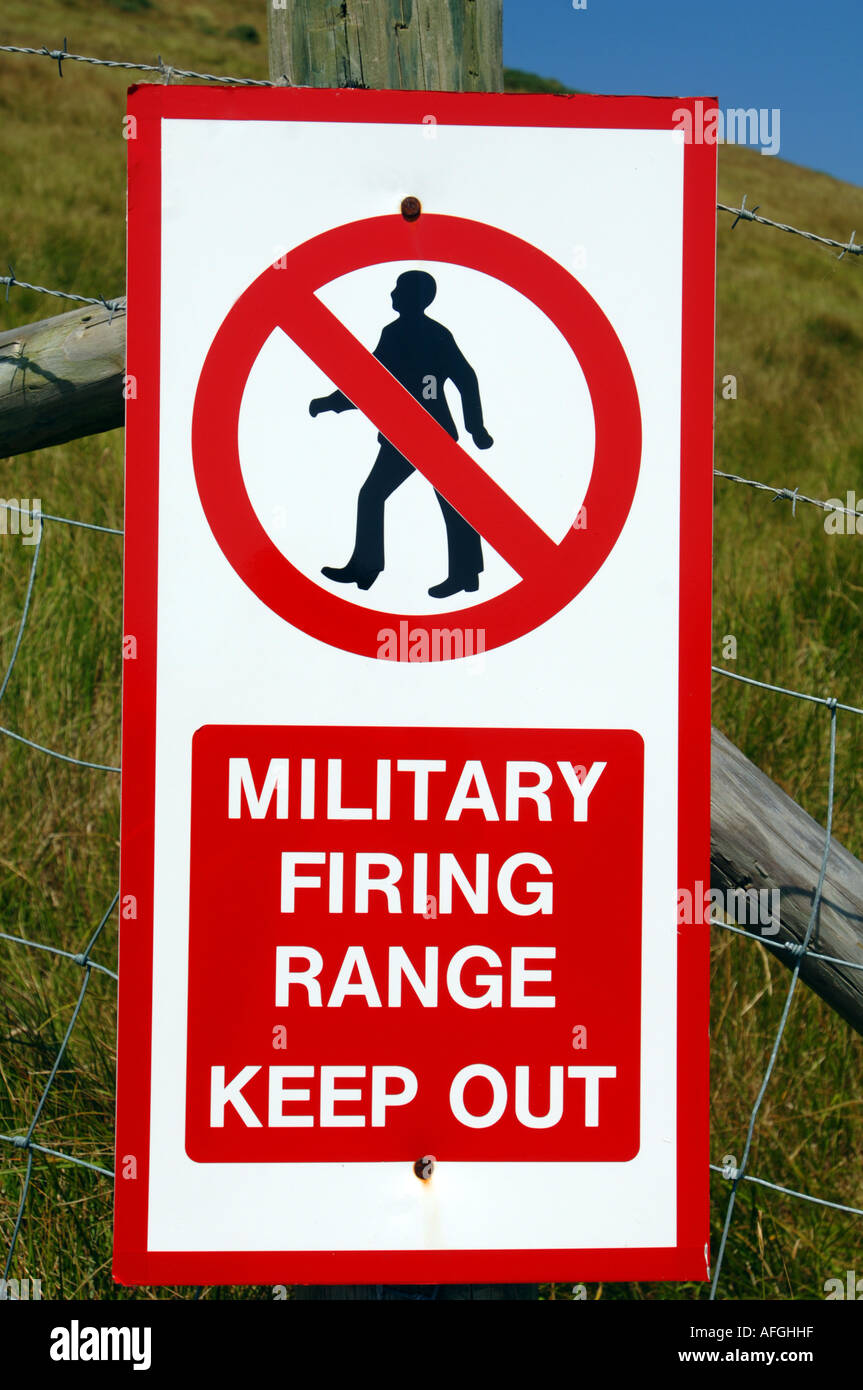 Military Firing Range warning sign by Lulworth Cove in Dorset Britain UK Stock Photo